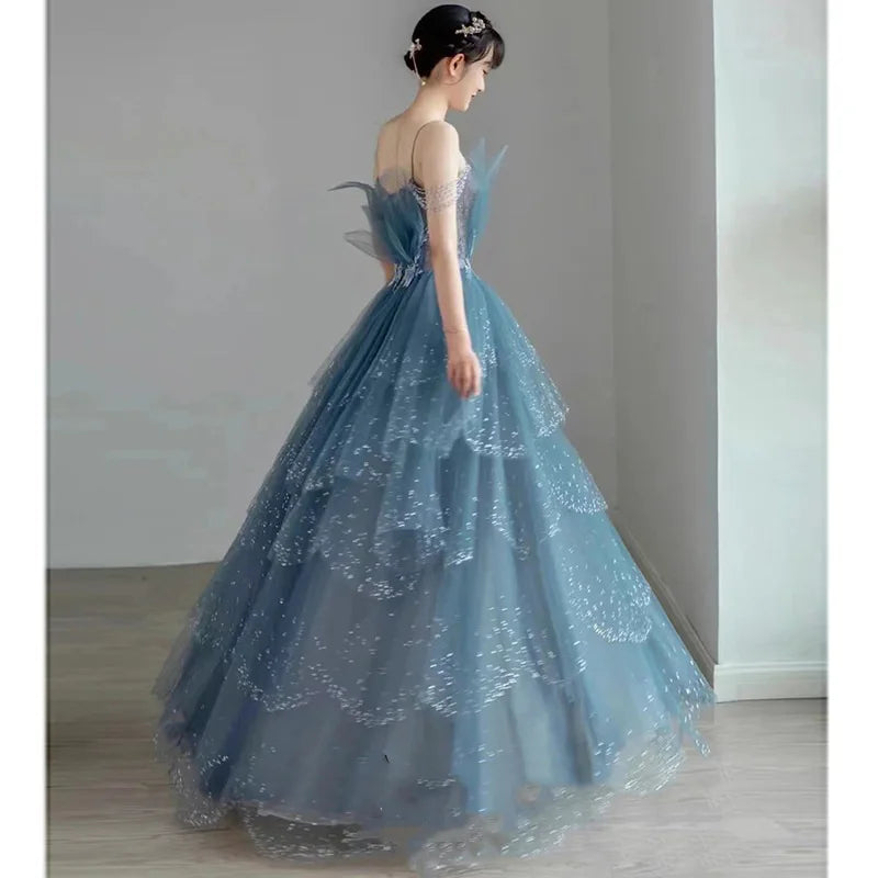 Hnewly Blue Spaghetti Strap Evening Dress Luxury Tulle Applique Princess Cake   Gown Sexy Illusion Backless Long Quinceanera Dresses