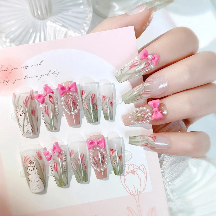 Hnewly Medium Length Fake Nails 3D Flower Pearl Designs Nude Pink Color Press on Nails Ballerina False Nails for Women DIY Manicure