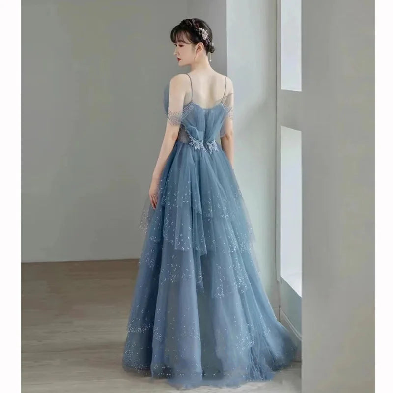 Hnewly Blue Spaghetti Strap Evening Dress Luxury Tulle Applique Princess Cake   Gown Sexy Illusion Backless Long Quinceanera Dresses